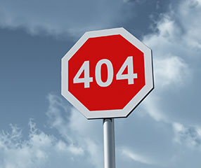 Das Bild zeigt ein 404-Schild vor Wolkenhimmel